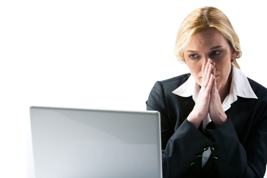 Photo of frustrated businesswoman looking at laptop display and thinking at work