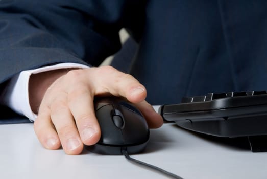 businessman with hand on mouse