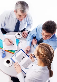 Image of two businessmen advise young colleague