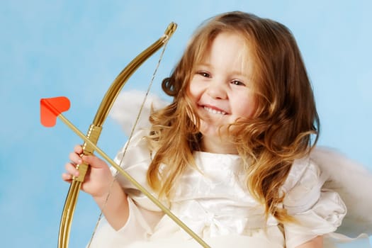 Cute female cupid holding bow