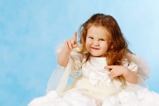 Emotional little female cupid pointing