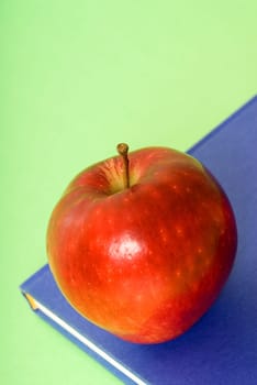 apple on top of a book for school