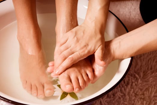 woman in a spa getting a foot massage