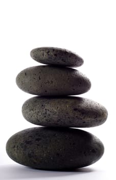 stack of hot stones for lastone massage