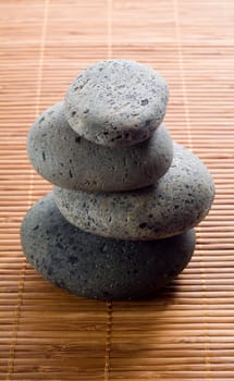 stack of hot stones for lastone massage