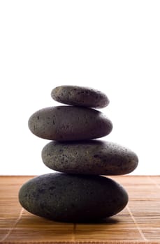 stack of hot stones for lastone massage