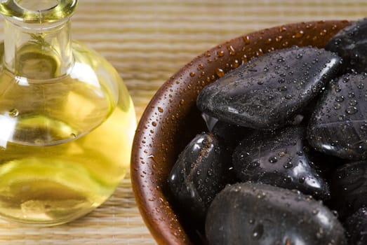 bowl of hot stones for lastone massage