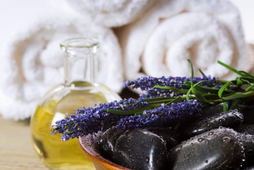 bowl of hot stones for lastone massage