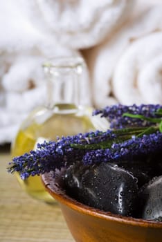 bowl of hot stones for lastone massage