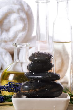 bowl of hot stones for lastone massage