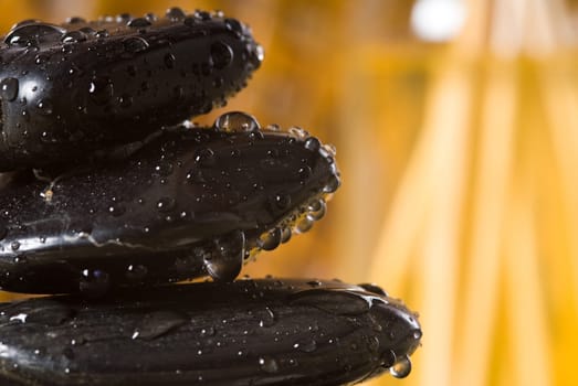 stack of hot stones for lastone massage