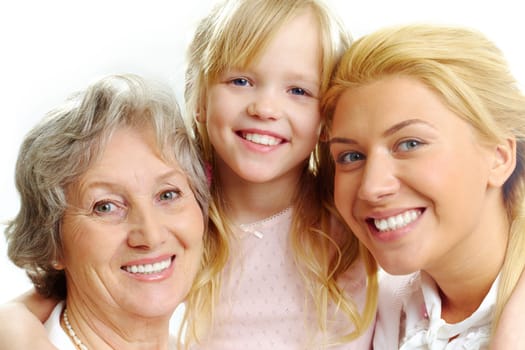 Photo of little girl with her grandmother and mother