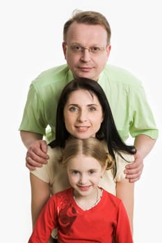 Image of family faces looking at camera and smiling on white background