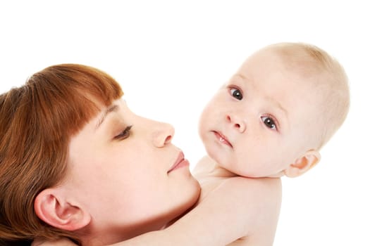 Close-up of careful mummy with her baby on white background