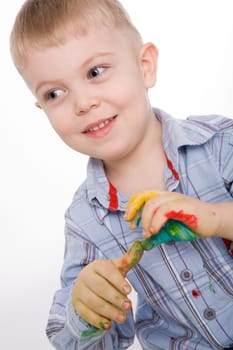 Image of preschooler with painted hands over white background