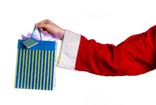 santa arm giving a xmas bag present on white