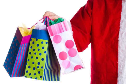 santa clause with some bags presents on white