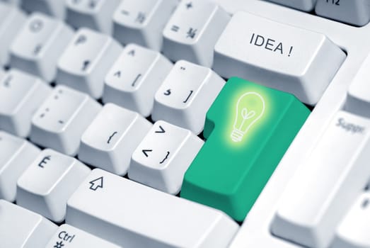 light bulb in the key of a keyboard computer