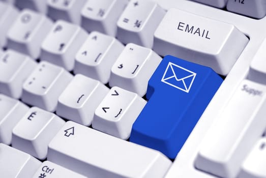 email button on a white keyboard computer