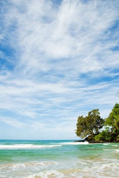 tropical beach in panama with some waves crashing