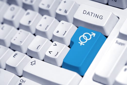 symbol for a man and a woman on the computer