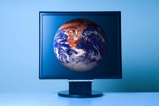 stand alone computer screen on blue