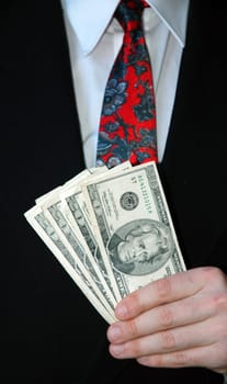 holding cash with suit