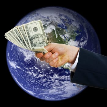business man hand with money over the planet
