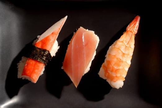 3 sushi on a plate