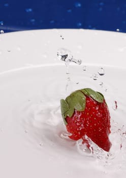 strawberry in water