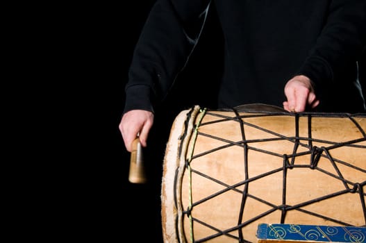 one musician playing drums in a studio