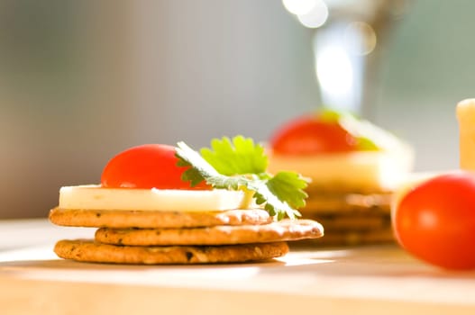 cheese and crackers on a cutting board