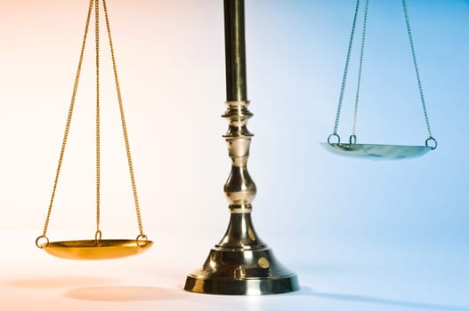 Wooden justice gavel and block with brass