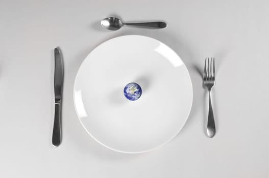 planet earth on a plate for world hunger