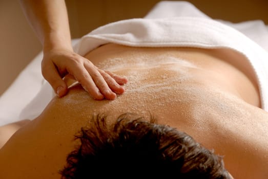 woman in a spa getting a salt glow