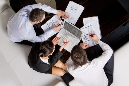 Above view of business workteam thinking about new project at meeting