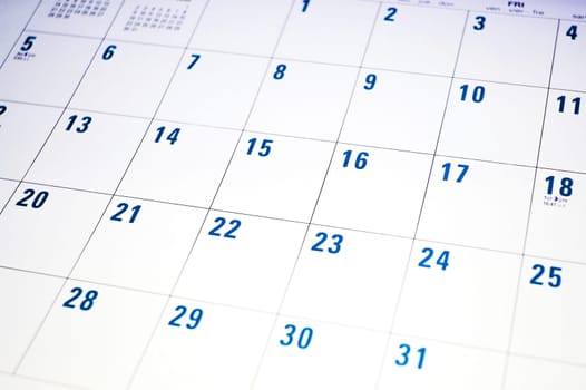 Calendar page with dates in blue and white