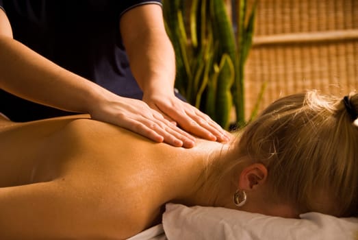 woman at a day spa getting a nice massage