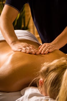 woman at a day spa getting a nice massage