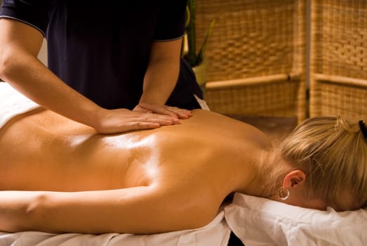 woman at a day spa getting a nice massage