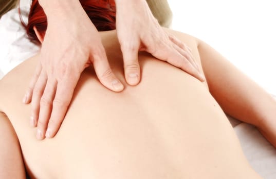 woman in a spa getting a back massage