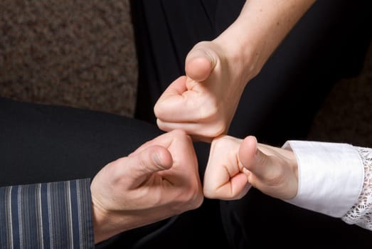 3 colleagues with their thumbs up
