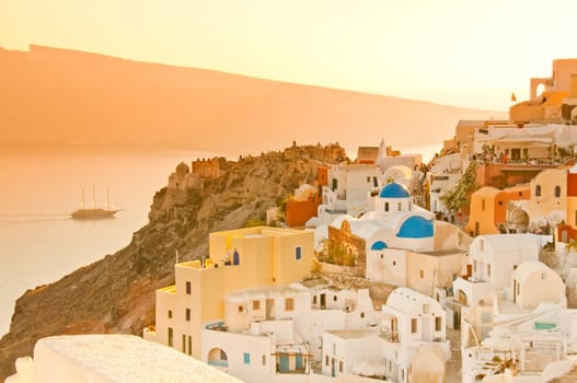 Greek church in santorini greece with a cross