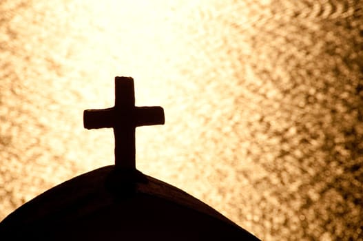 Greek church in santorini greece with a cross