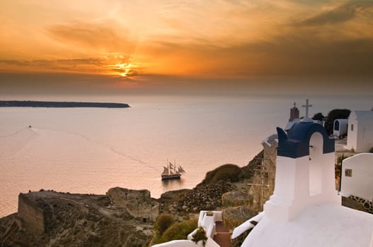 Greek church in santorini greece with a cross