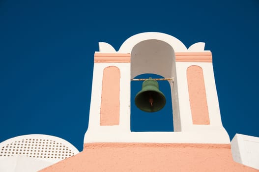 Greek church in santorini greece with a cross