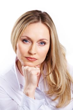 Portrait of elegant woman putting her chin on hand