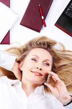 Above view of beautiful businesswoman calling by mobile