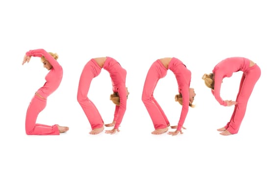 Creative image of fit girl imitating numbers of the year of 2009 over white background