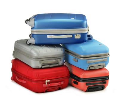 Luggage consisting of polycarbonate suitcases isolated on white